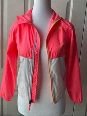 The North Face Neon Coral and Light Gray Hooded Kids Windbreaker